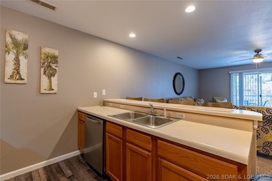 Turn-key, fully furnished and beautifully updated-this oversized on Osage National Golf Club in Missouri - for sale on GolfHomes.com, golf home, golf lot