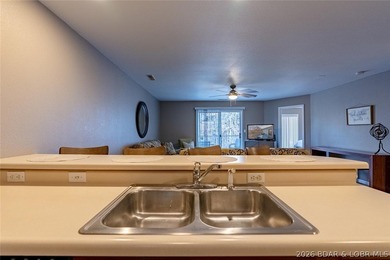 Turn-key, fully furnished and beautifully updated-this oversized on Osage National Golf Club in Missouri - for sale on GolfHomes.com, golf home, golf lot