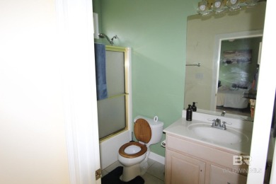 this elegant open home on the beautiful golf course in the on Peninsula Golf and Racquet Club in Alabama - for sale on GolfHomes.com, golf home, golf lot