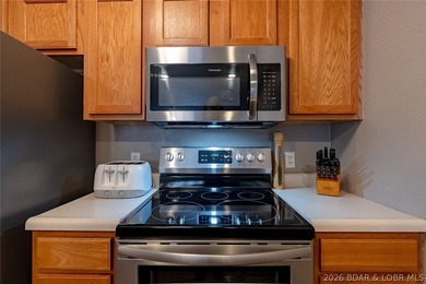 Turn-key, fully furnished and beautifully updated-this oversized on Osage National Golf Club in Missouri - for sale on GolfHomes.com, golf home, golf lot