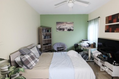 this elegant open home on the beautiful golf course in the on Peninsula Golf and Racquet Club in Alabama - for sale on GolfHomes.com, golf home, golf lot