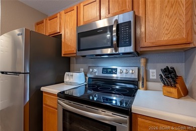 Turn-key, fully furnished and beautifully updated-this oversized on Osage National Golf Club in Missouri - for sale on GolfHomes.com, golf home, golf lot