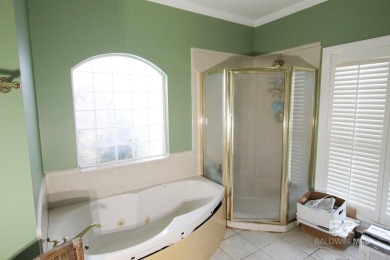 this elegant open home on the beautiful golf course in the on Peninsula Golf and Racquet Club in Alabama - for sale on GolfHomes.com, golf home, golf lot