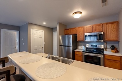 Turn-key, fully furnished and beautifully updated-this oversized on Osage National Golf Club in Missouri - for sale on GolfHomes.com, golf home, golf lot