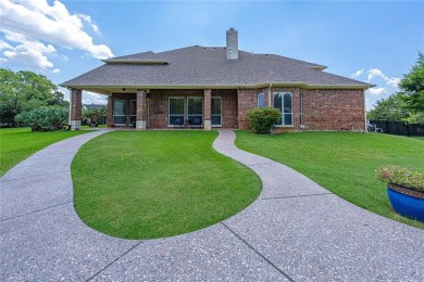 Live the Lake Ridge lifestyle in this beautifully updated 4,540 on Tangle Ridge Golf Club in Texas - for sale on GolfHomes.com, golf home, golf lot