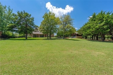 Live the Lake Ridge lifestyle in this beautifully updated 4,540 on Tangle Ridge Golf Club in Texas - for sale on GolfHomes.com, golf home, golf lot