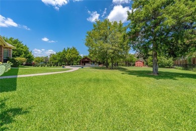 Live the Lake Ridge lifestyle in this beautifully updated 4,540 on Tangle Ridge Golf Club in Texas - for sale on GolfHomes.com, golf home, golf lot