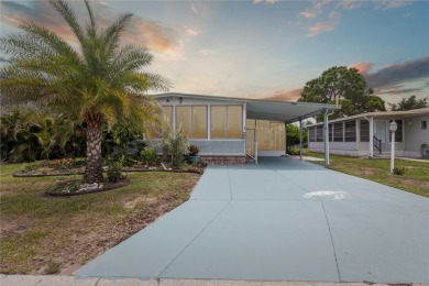 Welcome to Barefoot Bay! This cozy 2 bedroom, 2 bath home is on Barefoot Bay Golf Course in Florida - for sale on GolfHomes.com, golf home, golf lot