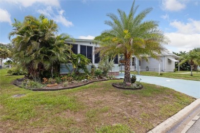 Welcome to Barefoot Bay! This cozy 2 bedroom, 2 bath home is on Barefoot Bay Golf Course in Florida - for sale on GolfHomes.com, golf home, golf lot