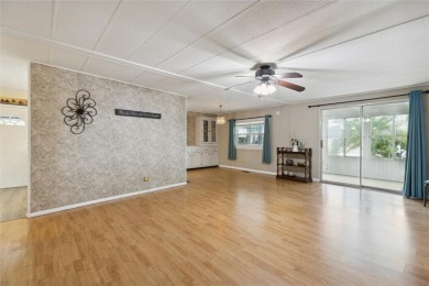 Welcome to Barefoot Bay! This cozy 2 bedroom, 2 bath home is on Barefoot Bay Golf Course in Florida - for sale on GolfHomes.com, golf home, golf lot
