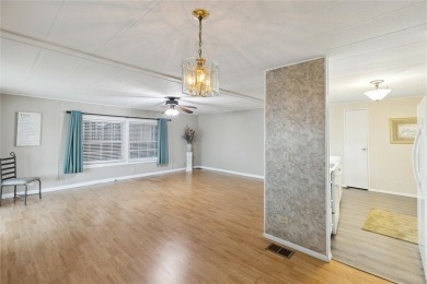 Welcome to Barefoot Bay! This cozy 2 bedroom, 2 bath home is on Barefoot Bay Golf Course in Florida - for sale on GolfHomes.com, golf home, golf lot