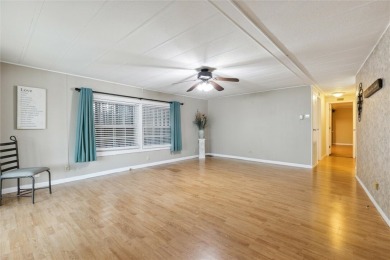 Welcome to Barefoot Bay! This cozy 2 bedroom, 2 bath home is on Barefoot Bay Golf Course in Florida - for sale on GolfHomes.com, golf home, golf lot