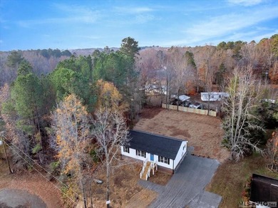 Professional MLS Description (Plain Text)  Discover modern on Tanglewood Shores Golf Club in Virginia - for sale on GolfHomes.com, golf home, golf lot