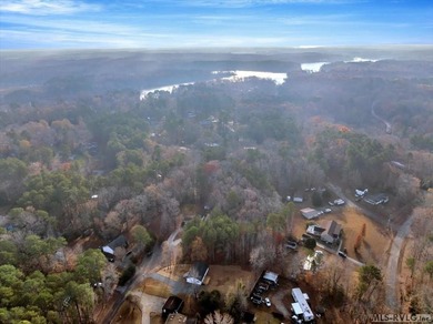 Professional MLS Description (Plain Text)  Discover modern on Tanglewood Shores Golf Club in Virginia - for sale on GolfHomes.com, golf home, golf lot