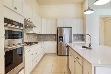 **REDUCED TO SELL**
This 4-bedroom, 3-bathroom home, plus 2 dens on Palm Beach Gardens Golf Course in Florida - for sale on GolfHomes.com, golf home, golf lot
