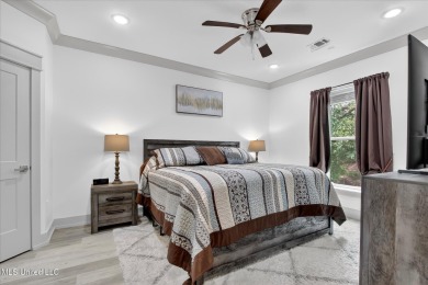 Rare opportunity to own a ground-level, three years young condo on Diamondhead Country Club in Mississippi - for sale on GolfHomes.com, golf home, golf lot