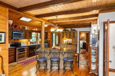 Step into serenity at 2111 Moorefield Memorial Highway, where on The Rock At Jocassee in South Carolina - for sale on GolfHomes.com, golf home, golf lot