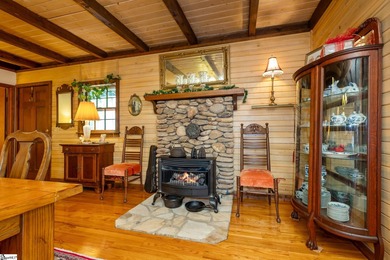 Step into serenity at 2111 Moorefield Memorial Highway, where on The Rock At Jocassee in South Carolina - for sale on GolfHomes.com, golf home, golf lot