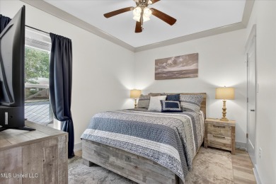 Rare opportunity to own a ground-level, three years young condo on Diamondhead Country Club in Mississippi - for sale on GolfHomes.com, golf home, golf lot