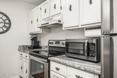 This charming 2 bed, 2 bath townhome is just steps from Lake on Druid Hills Golf Club in Tennessee - for sale on GolfHomes.com, golf home, golf lot