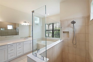 **REDUCED TO SELL**
This 4-bedroom, 3-bathroom home, plus 2 dens on Palm Beach Gardens Golf Course in Florida - for sale on GolfHomes.com, golf home, golf lot