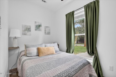 Rare opportunity to own a ground-level, three years young condo on Diamondhead Country Club in Mississippi - for sale on GolfHomes.com, golf home, golf lot