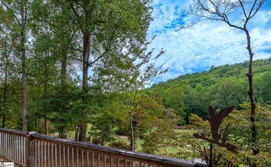 Step into serenity at 2111 Moorefield Memorial Highway, where on The Rock At Jocassee in South Carolina - for sale on GolfHomes.com, golf home, golf lot