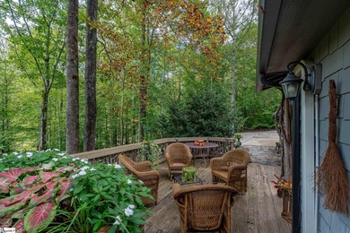 Step into serenity at 2111 Moorefield Memorial Highway, where on The Rock At Jocassee in South Carolina - for sale on GolfHomes.com, golf home, golf lot