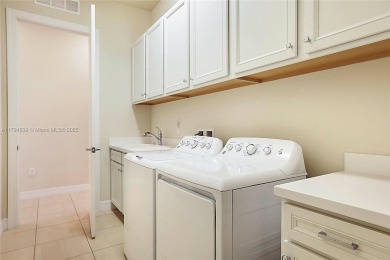 **REDUCED TO SELL**
This 4-bedroom, 3-bathroom home, plus 2 dens on Palm Beach Gardens Golf Course in Florida - for sale on GolfHomes.com, golf home, golf lot