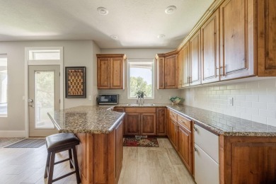 This exceptional, immaculate, 4 bedroom, 3 bath, 2 level home on Sunbrook Golf Course in Utah - for sale on GolfHomes.com, golf home, golf lot