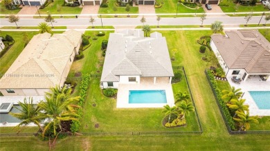 **REDUCED TO SELL**
This 4-bedroom, 3-bathroom home, plus 2 dens on Palm Beach Gardens Golf Course in Florida - for sale on GolfHomes.com, golf home, golf lot