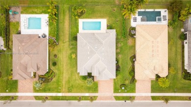 **REDUCED TO SELL**
This 4-bedroom, 3-bathroom home, plus 2 dens on Palm Beach Gardens Golf Course in Florida - for sale on GolfHomes.com, golf home, golf lot