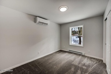 Brand-New Construction with Seasonal Lake Views of Roamingwood on The Hideout Golf in Pennsylvania - for sale on GolfHomes.com, golf home, golf lot