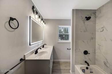 Brand-New Construction with Seasonal Lake Views of Roamingwood on The Hideout Golf in Pennsylvania - for sale on GolfHomes.com, golf home, golf lot