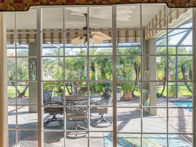 This delightful, 3-bed, 2-bath, heated salt-water pool home is a on Lake Ashton Golf Club in Florida - for sale on GolfHomes.com, golf home, golf lot