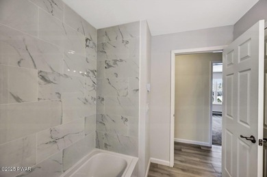 Brand-New Construction with Seasonal Lake Views of Roamingwood on The Hideout Golf in Pennsylvania - for sale on GolfHomes.com, golf home, golf lot