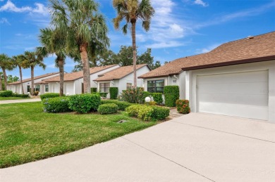 Appealing two bedroom, two bath, end unit villa, with attached on Sawgrass Golf Club in Florida - for sale on GolfHomes.com, golf home, golf lot