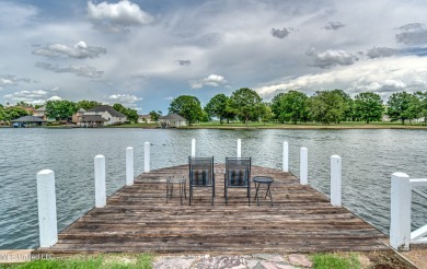 NEW PRICE on this WATERFRONT property on gated Belle Pointe of on Lake Caroline Golf Club in Mississippi - for sale on GolfHomes.com, golf home, golf lot