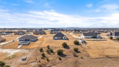 Custom built home in prestigious Rolling Creek Ranch. This on De Cordova Bend Country Club in Texas - for sale on GolfHomes.com, golf home, golf lot