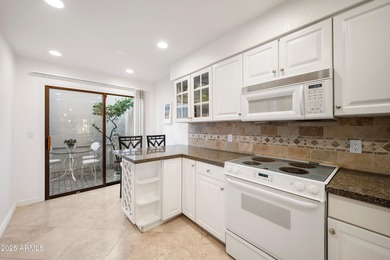 Step into this beautiful 2-bedroom, 2.5-bath townhome perfectly on Arizona Biltmore Golf and Country Club in Arizona - for sale on GolfHomes.com, golf home, golf lot