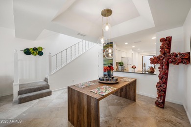 Step into this beautiful 2-bedroom, 2.5-bath townhome perfectly on Arizona Biltmore Golf and Country Club in Arizona - for sale on GolfHomes.com, golf home, golf lot