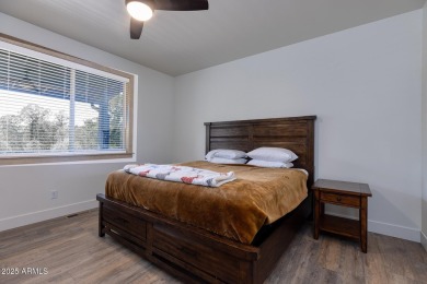 Nestled in the heart of Bison Pass, this stunning 2-bedroom on Torreon Golf Club in Arizona - for sale on GolfHomes.com, golf home, golf lot