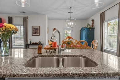 Stunning and spacious four-bedroom home with a versatile bonus on Anderson Creek Golf Club in North Carolina - for sale on GolfHomes.com, golf home, golf lot