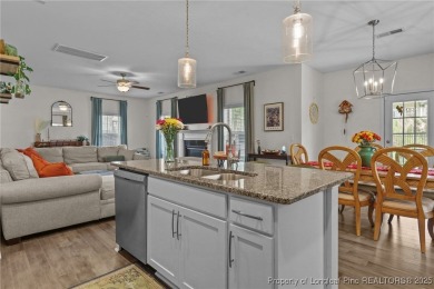 Stunning and spacious four-bedroom home with a versatile bonus on Anderson Creek Golf Club in North Carolina - for sale on GolfHomes.com, golf home, golf lot