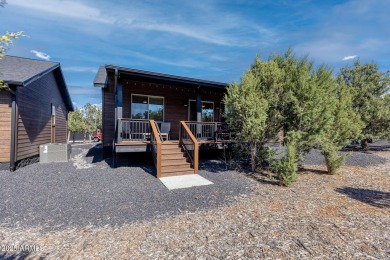 Nestled in the heart of Bison Pass, this stunning 2-bedroom on Torreon Golf Club in Arizona - for sale on GolfHomes.com, golf home, golf lot