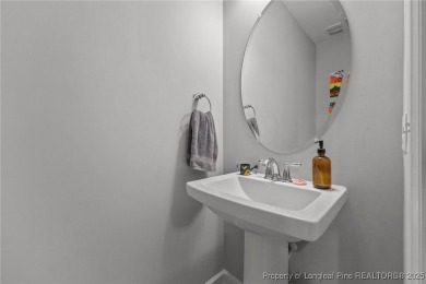 Stunning and spacious four-bedroom home with a versatile bonus on Anderson Creek Golf Club in North Carolina - for sale on GolfHomes.com, golf home, golf lot