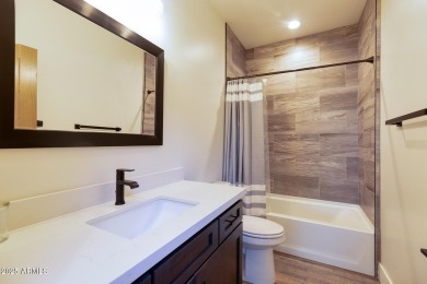 Nestled in the heart of Bison Pass, this stunning 2-bedroom on Torreon Golf Club in Arizona - for sale on GolfHomes.com, golf home, golf lot