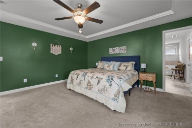 Stunning and spacious four-bedroom home with a versatile bonus on Anderson Creek Golf Club in North Carolina - for sale on GolfHomes.com, golf home, golf lot