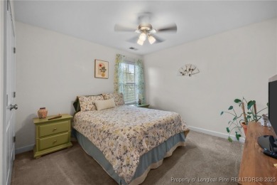 Stunning and spacious four-bedroom home with a versatile bonus on Anderson Creek Golf Club in North Carolina - for sale on GolfHomes.com, golf home, golf lot