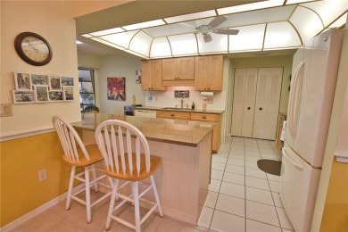 Welcome to this charming 2-bedroom, 2-bathroom home with a 2-car on Oyster Creek Golf Club in Florida - for sale on GolfHomes.com, golf home, golf lot